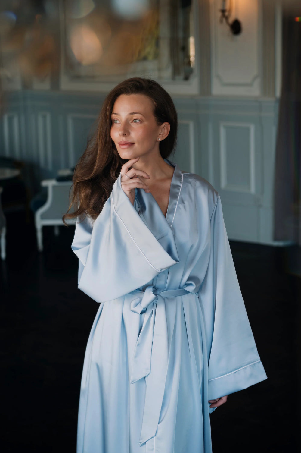 Alina, founder of Atelier Soi — quiet morning moment in satin loungewear